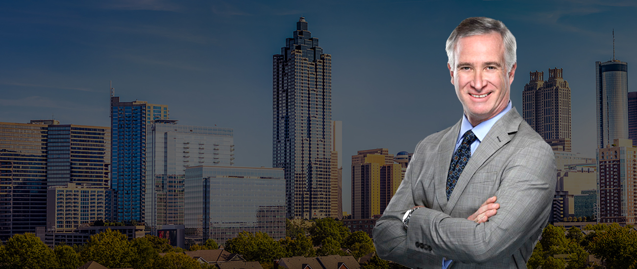 Attorney Picture over skyline of Atlanta